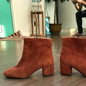 Orange suede ankle booties